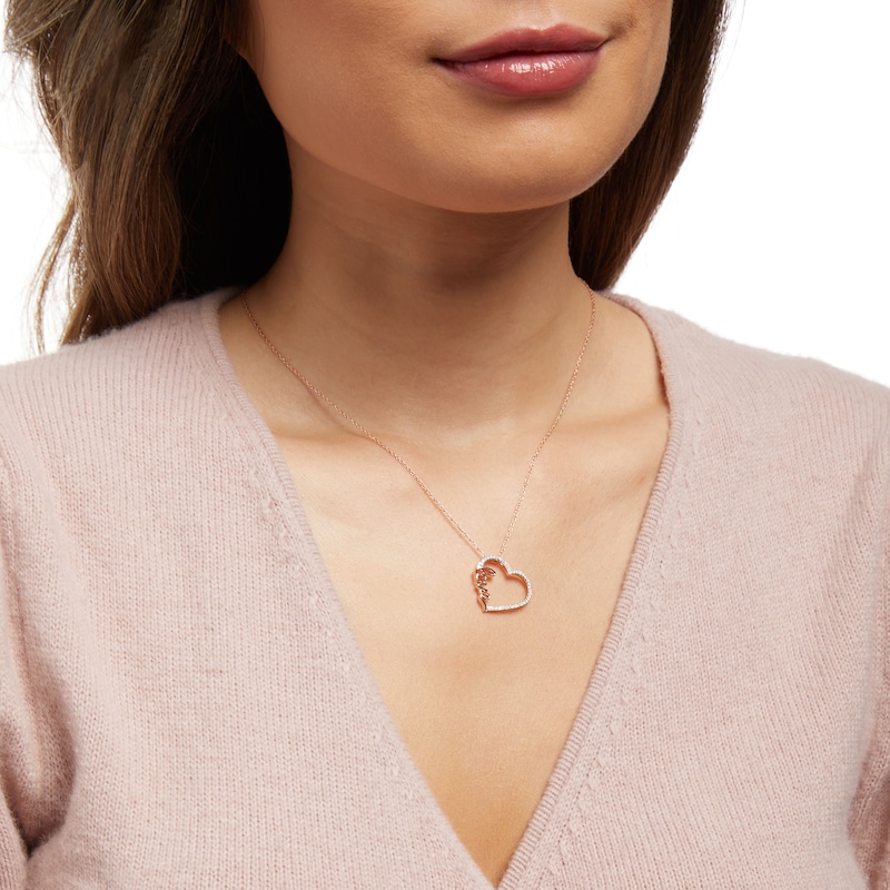 1/5 CT. T.W. Diamond Cursive Script "love" Tilted Heart Pendant in 10K Rose Gold