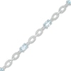 Thumbnail Image 1 of Oval Aquamarine and Diamond Accent Beaded Link Duo Alternating Line Bracelet in Sterling Silver - 7.25"