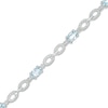 Thumbnail Image 0 of Oval Aquamarine and Diamond Accent Beaded Link Duo Alternating Line Bracelet in Sterling Silver - 7.25"