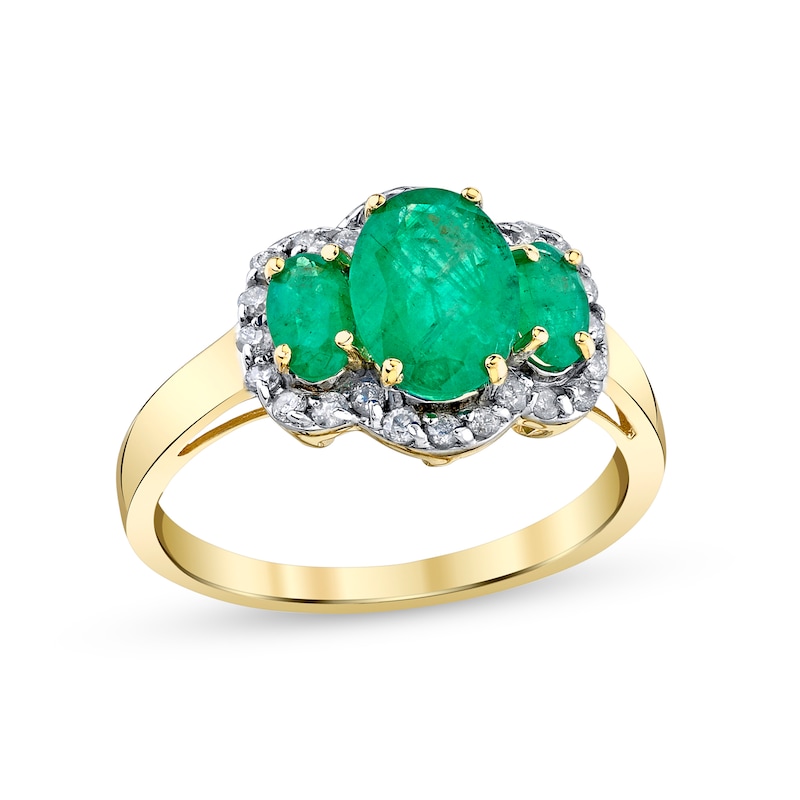 Oval Emerald and 1/4 CT. T.W. Diamond Frame Three Stone Ring in 14K Gold