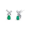 Thumbnail Image 0 of Pear-Shaped Emerald and 1/4 CT. T.W. Diamond Twist Stud Earrings in 14K White Gold