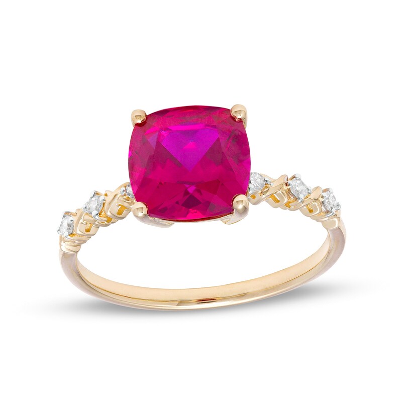 Main Image 1 of 8.0mm Cushion-Cut Lab-Created Ruby and 1/15 CT. T.W. Diamond "X" Shank Ring in 10K Gold