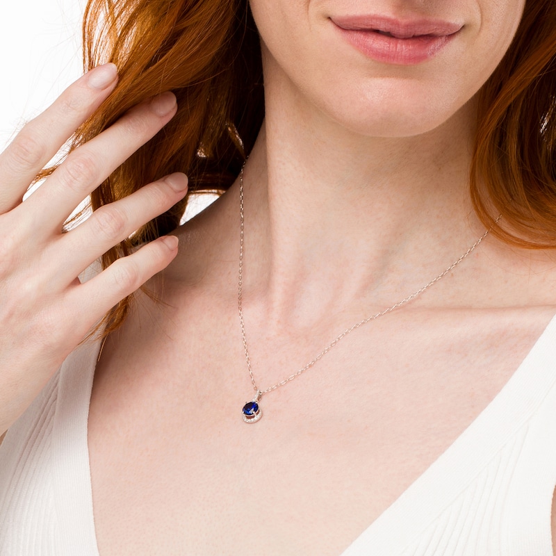 Main Image 2 of 7.0mm Blue Lab-Created Sapphire and 1/10 CT. T.W. Diamond Curlique Pendant in 10K White Gold