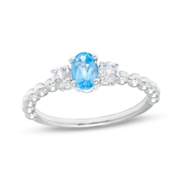 Oval Blue Topaz and White Lab-Created Sapphire Three Stone Bead Ring in Sterling Silver