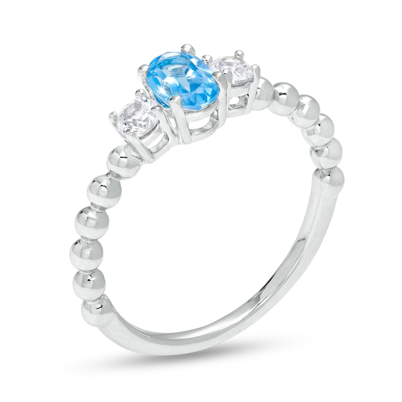 Main Image 3 of Oval Blue Topaz and White Lab-Created Sapphire Three Stone Bead Ring in Sterling Silver