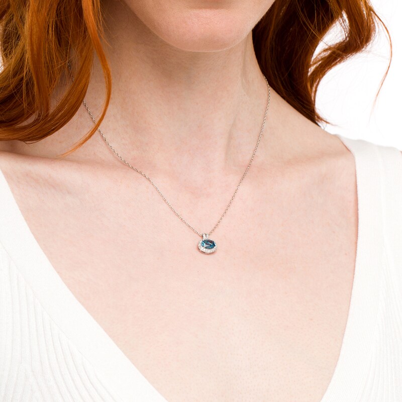 Oval London Blue Topaz and White Lab-Created Sapphire Frame Drop Pendant in Sterling Silver