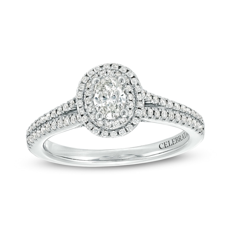 Main Image 1 of Celebration Infinite™ 3/4 CT. T.W. Certified Oval Diamond Frame Split Shank Engagement Ring in 14K White Gold (I/SI2)