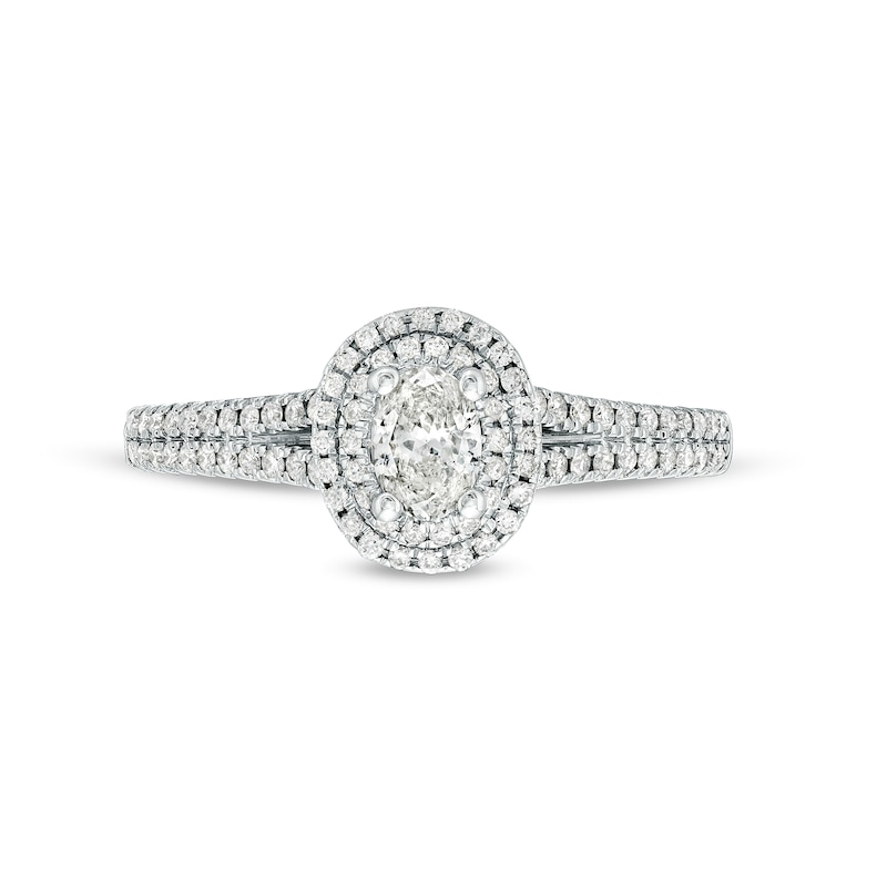 Main Image 4 of Celebration Infinite™ 3/4 CT. T.W. Certified Oval Diamond Frame Split Shank Engagement Ring in 14K White Gold (I/SI2)