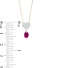 Thumbnail Image 2 of Oval Ruby and Diamond Accent Beaded Heart Dangle Pendant in 10K Gold