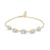 Thumbnail Image 1 of Oval Swiss Blue Topaz and Diamond Accent Twist Five Stone Bracelet in 10K Gold – 8.0"