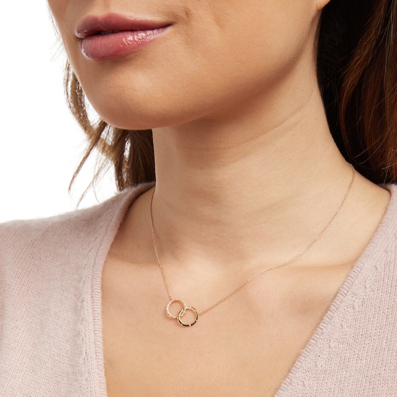 Main Image 2 of 1/20 CT. T.W. Diamond Interlocking Circle Necklace in 10K Gold – 17"