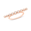 Thumbnail Image 1 of 1/4 CT. T.W. Diamond Bezel Graduated Bar Ring in 10K Rose Gold