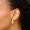 Thumbnail Image 1 of Diamond-Cut 8.0mm Oval Hoop Earrings in 10K Gold