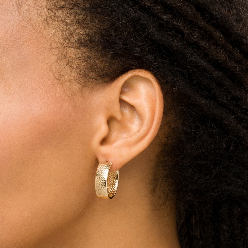 Diamond-Cut 8.0mm Oval Hoop Earrings in 10K Gold