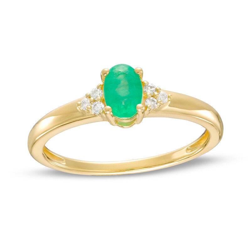 Main Image 1 of Oval Emerald and 1/20 CT. T.W. Diamond Tri-Sides Ring in 10K Gold - Size 7