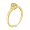 Thumbnail Image 2 of Oval Peridot and 1/20 CT. T.W. Diamond Tri-Sides Ring in 10K Gold - Size 7