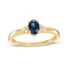 Thumbnail Image 1 of Oval Blue Sapphire and 1/20 CT. T.W. Diamond Tri-Sides Ring in 10K Gold - Size 7