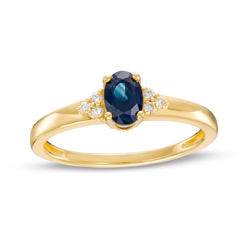 Main Image 1 of Oval Blue Sapphire and 1/20 CT. T.W. Diamond Tri-Sides Ring in 10K Gold - Size 7
