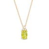 Thumbnail Image 0 of Oval Peridot and 1/20 Diamond CT. T.W. Diamond Pendant in 10K Gold