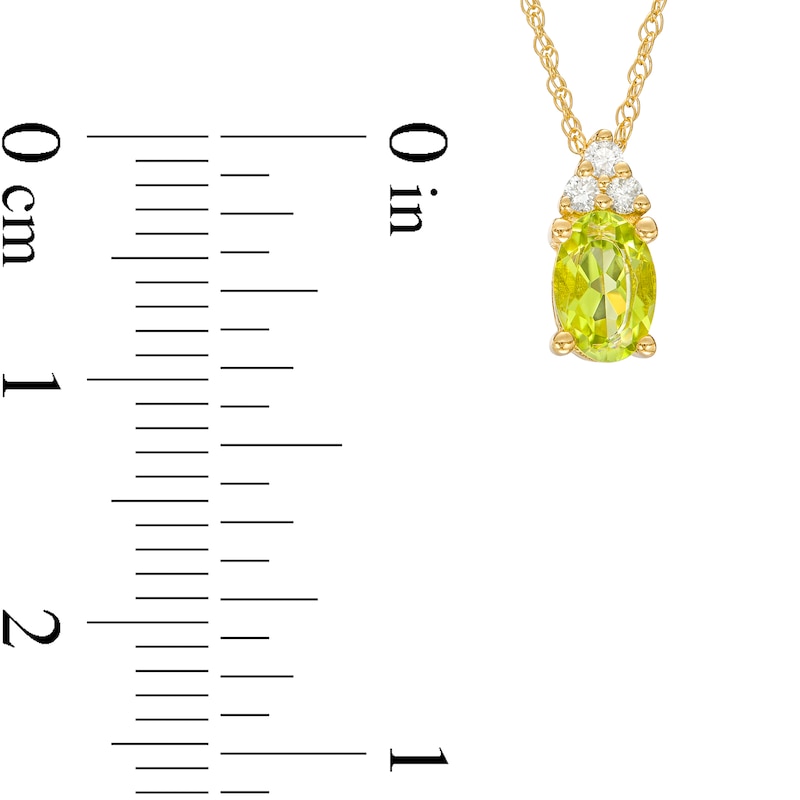 Main Image 3 of Oval Peridot and 1/20 Diamond CT. T.W. Diamond Pendant in 10K Gold