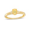 Thumbnail Image 1 of Oval Opal and 1/20 CT. T.W. Diamond Tri-Sides Ring in 10K Gold - Size 7