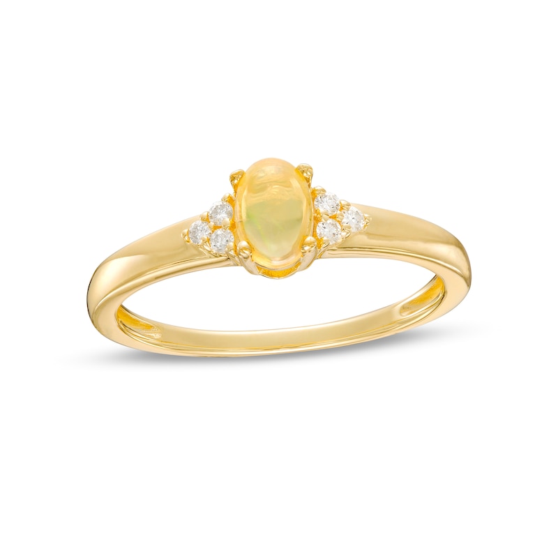 Main Image 1 of Oval Opal and 1/20 CT. T.W. Diamond Tri-Sides Ring in 10K Gold - Size 7