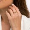 Thumbnail Image 2 of Oval Opal and 1/20 CT. T.W. Diamond Tri-Sides Ring in 10K Gold - Size 7
