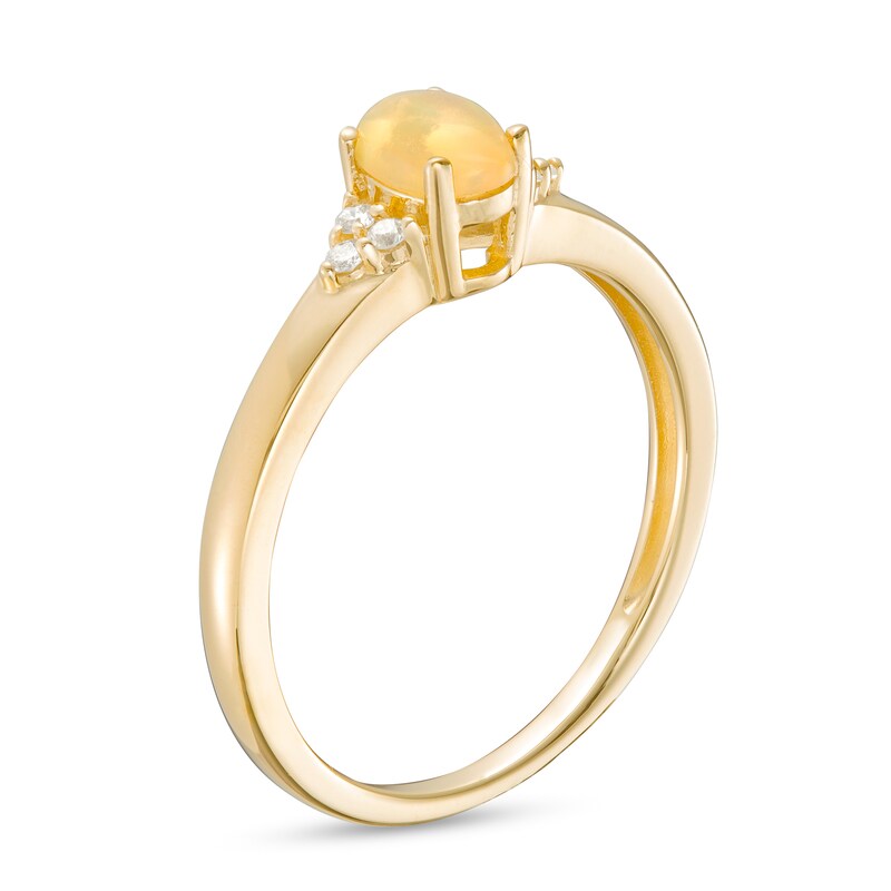 Main Image 3 of Oval Opal and 1/20 CT. T.W. Diamond Tri-Sides Ring in 10K Gold - Size 7
