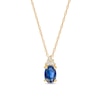 Thumbnail Image 1 of Oval Blue Sapphire and 1/20 CT. T.W. Diamond Pendant in 10K Gold