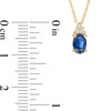 Thumbnail Image 3 of Oval Blue Sapphire and 1/20 CT. T.W. Diamond Pendant in 10K Gold