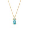 Thumbnail Image 0 of Oval Swiss Blue Topaz and 1/20 CT. T.W. Diamond Pendant in 10K Gold