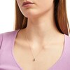 Thumbnail Image 1 of Oval Swiss Blue Topaz and 1/20 CT. T.W. Diamond Pendant in 10K Gold