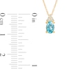 Thumbnail Image 2 of Oval Swiss Blue Topaz and 1/20 CT. T.W. Diamond Pendant in 10K Gold