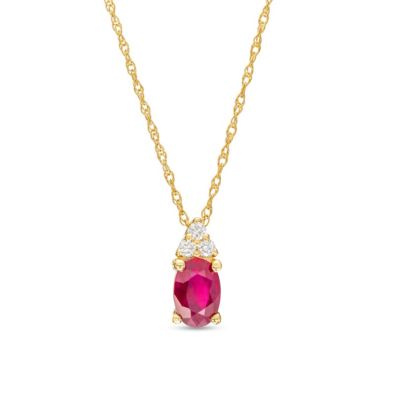 Main Image 1 of Oval Ruby and 1/20 CT. T.W. Diamond Pendant in 10K Gold