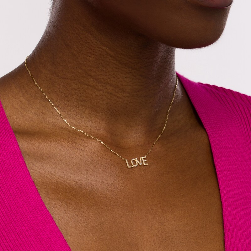 Main Image 2 of 1/15 CT. T.W. Diamond "LOVE" Necklace in 10K Gold - 16"