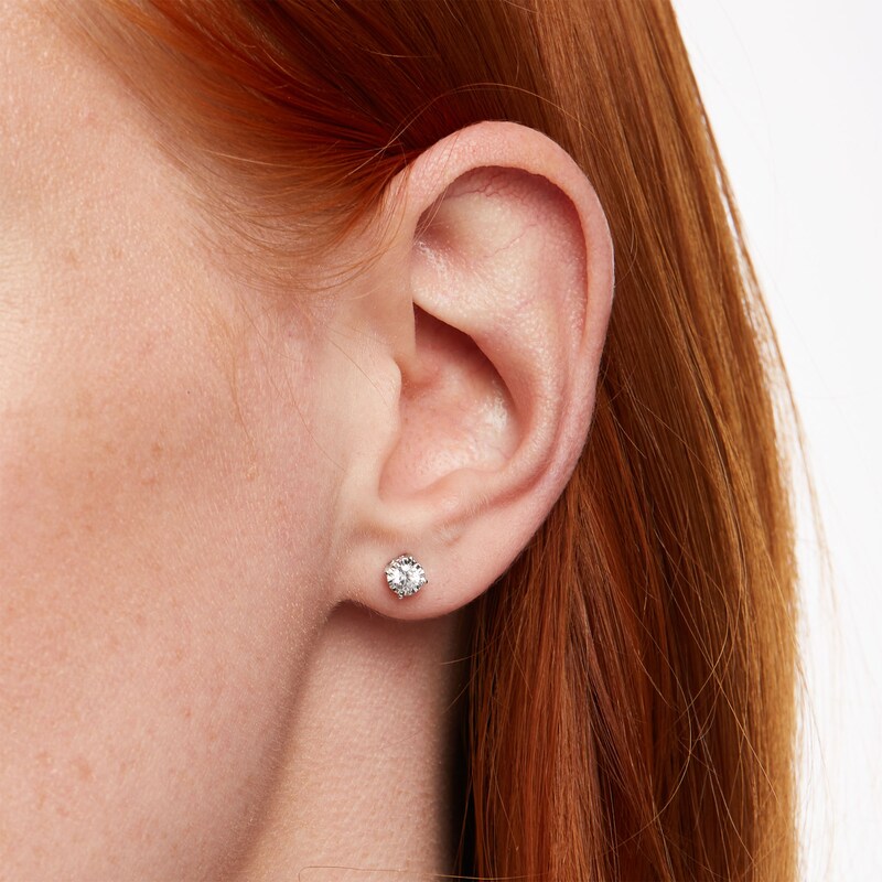 Main Image 2 of 1/2 CT. T.W. Diamond Solitaire Stud Earrings in 10K White Gold (J/I3)