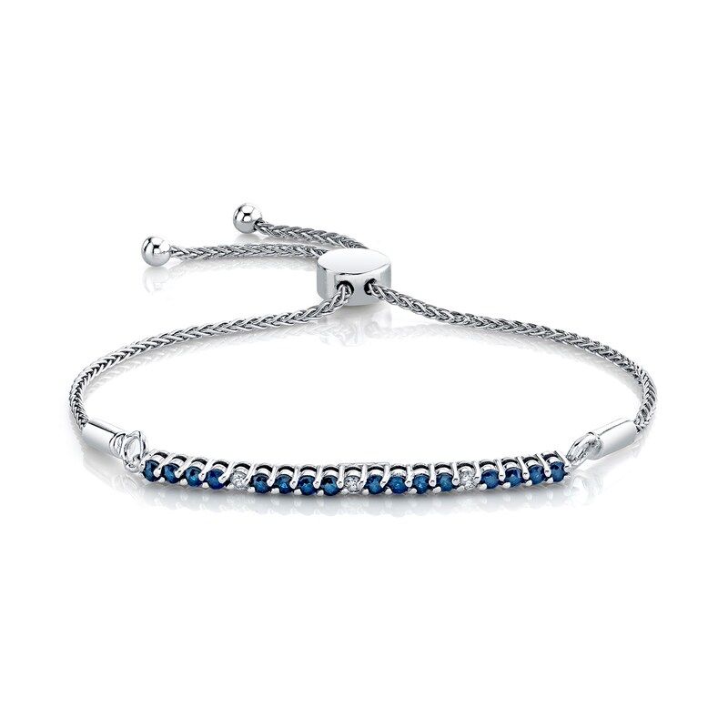 Main Image 1 of Blue Sapphire and 1/10 CT. T.W. Diamond Alternating Bolo Bracelet in Sterling Silver – 12"