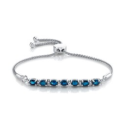 Oval Blue Sapphire and 1/15 CT. T.W. Diamond Alternating Bolo Bracelet in Sterling Silver – 12&quot;