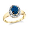 Thumbnail Image 1 of Oval Blue Sapphire and 1/6 CT. T.W. Baguette Diamond Frame Ring in 14K Gold