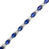 Thumbnail Image 1 of Oval Blue Lab-Created Sapphire and Diamond Accent Alternating Line Bracelet in Sterling Silver – 7.25"