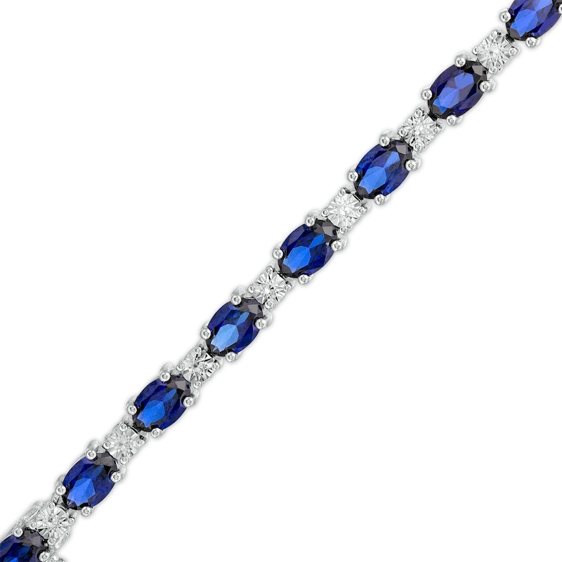 Main Image 1 of Oval Blue Lab-Created Sapphire and Diamond Accent Alternating Line Bracelet in Sterling Silver – 7.25"