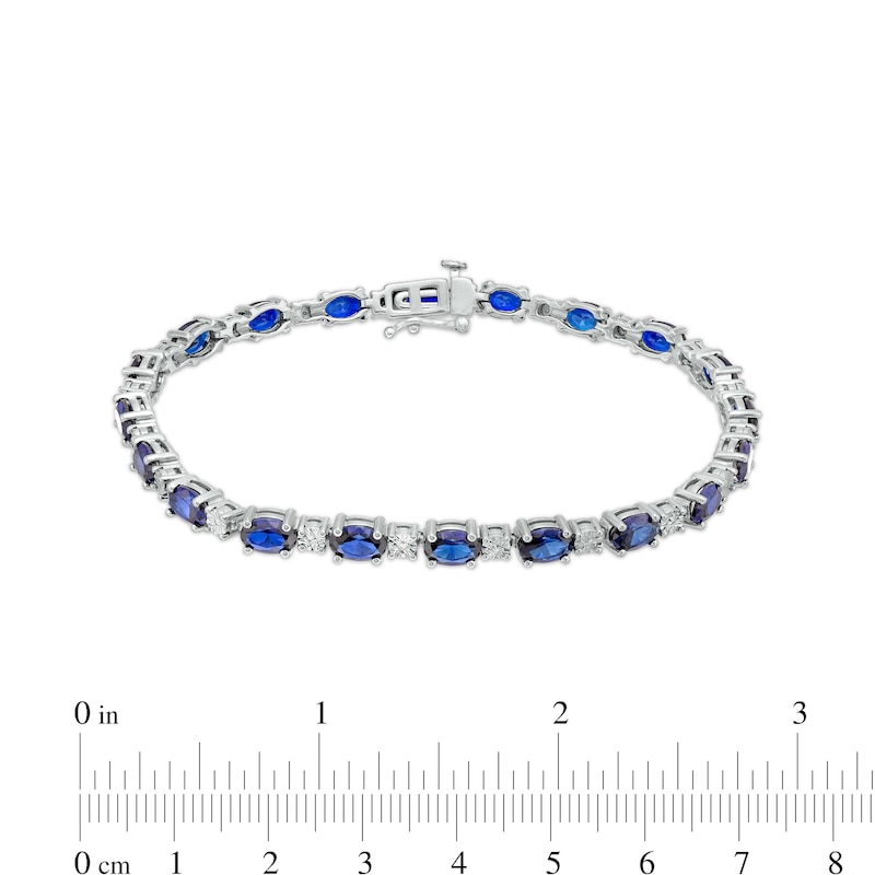 Main Image 4 of Oval Blue Lab-Created Sapphire and Diamond Accent Alternating Line Bracelet in Sterling Silver – 7.25"