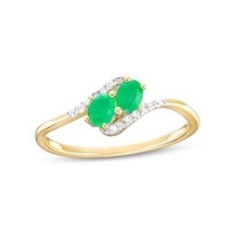 Oval Emerald and 1/20 CT. T.W. Diamond Bypass Ring in 10K Gold