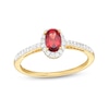 Thumbnail Image 1 of Oval Garnet and White Lab-Created Sapphire Frame Ring in 10K Gold