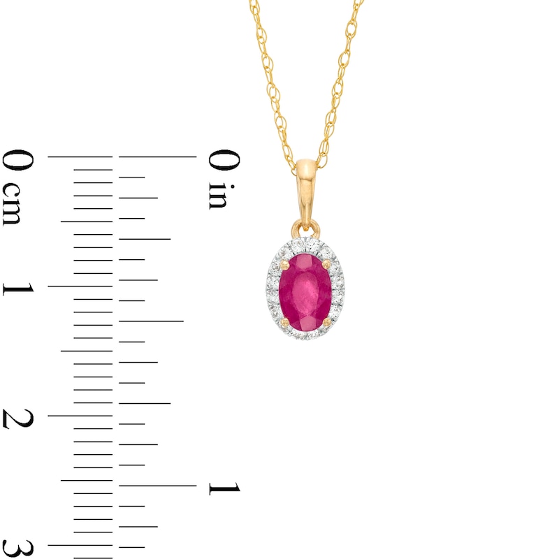 Main Image 3 of Oval Ruby and White Lab-Created Sapphire Frame Pendant in 10K Gold