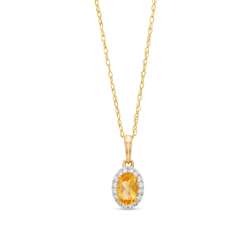 Main Image 1 of Oval Orange Citrine and White Lab-Created Sapphire Frame Pendant in 10K Gold