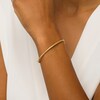 Thumbnail Image 2 of Italian Brilliance™ 2.5mm Diamond-Cut Glitter Bangle in Hollow 14K Gold