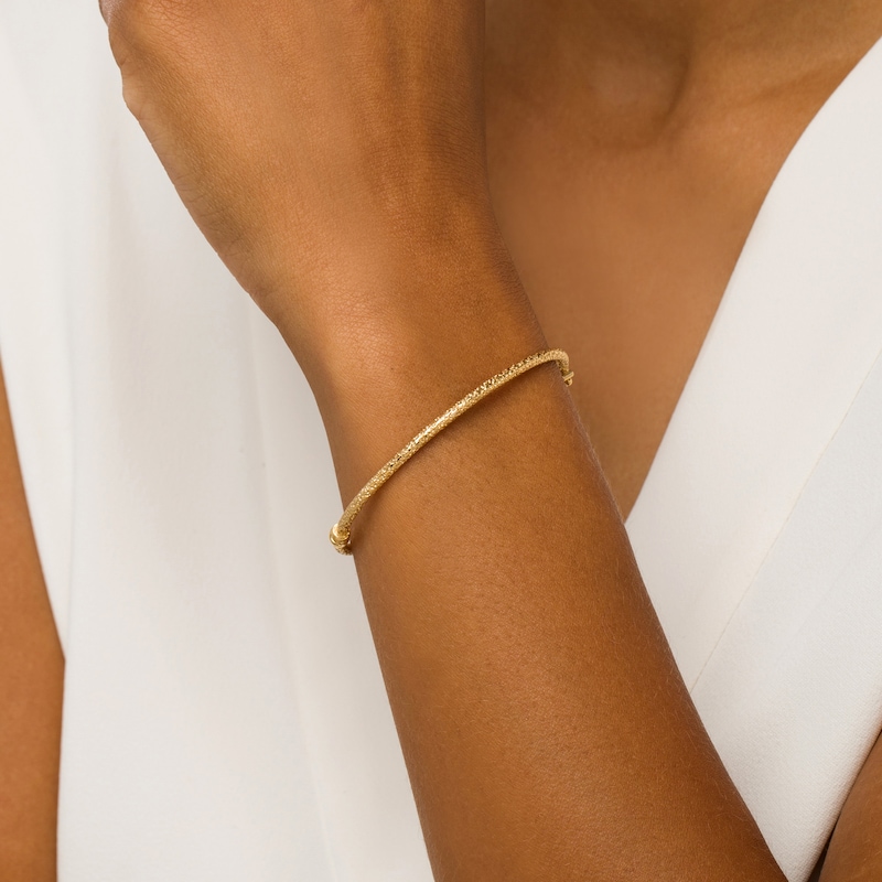 Main Image 2 of Italian Brilliance™ 2.5mm Diamond-Cut Glitter Bangle in Hollow 14K Gold