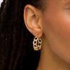 Thumbnail Image 1 of Oro Diamante™ 20.0mm Diamond-Cut Glitter Twist Hoop Earrings in 14K Gold