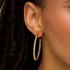 Thumbnail Image 1 of Oro Diamante™ 40.0mm Diamond-Cut Open Tube Hoop Earrings in 14K Gold